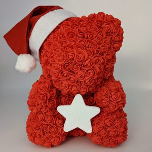 Ours rouge de Noël avec son étoile