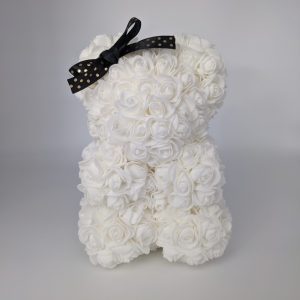 Ourson blanc avec son nœud noir à pois or
