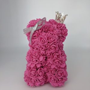 Ourson fuchsia avec sa couronne et son nœud