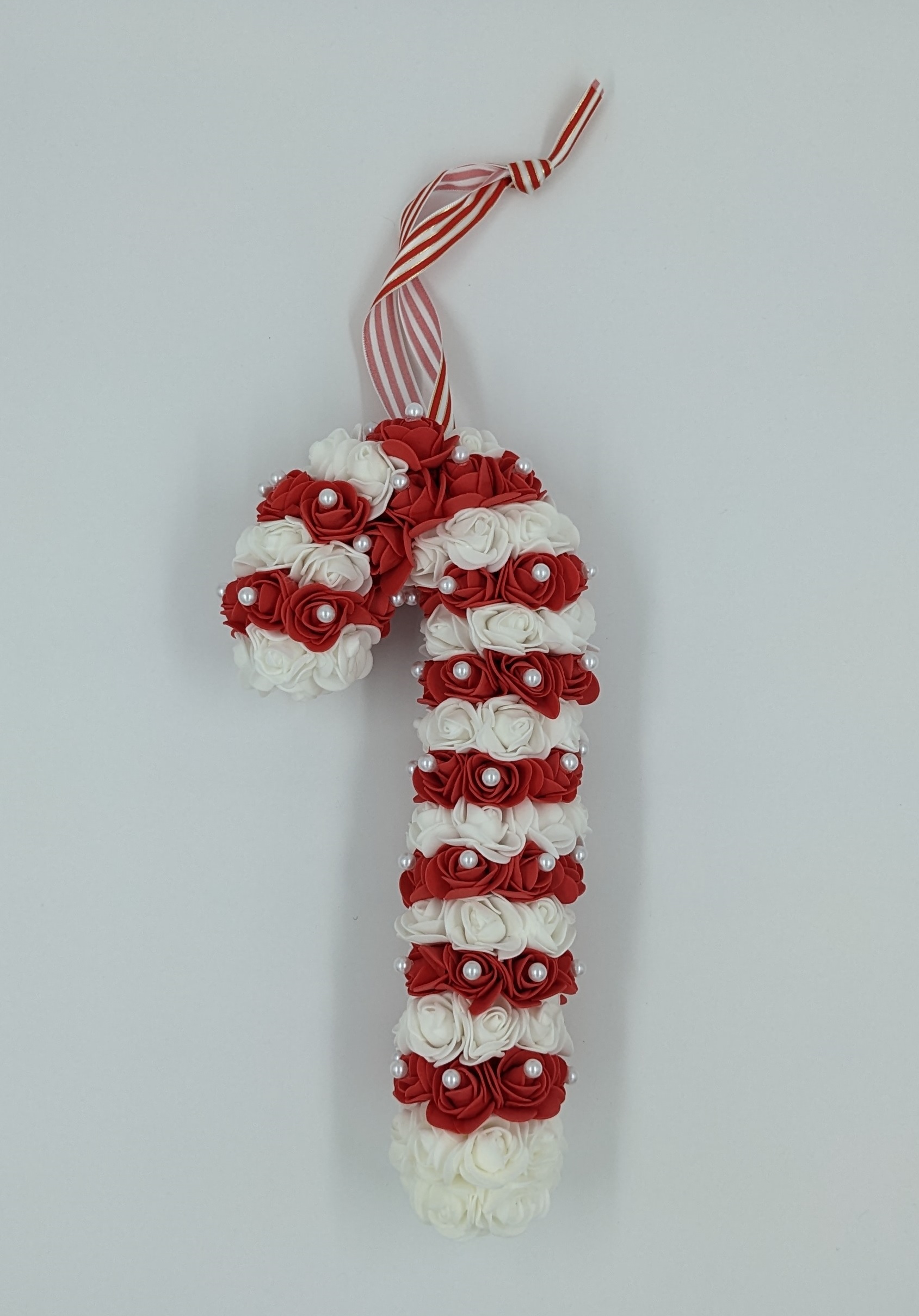 Sucre d'orge rouge et blanc avec perles